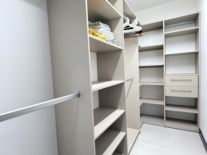 44 Condominio Bosques Del Cafe Mountains, Unit 44 Almont, CO 81210 - Photo 5 of 19 a view of walk in closet with empty racks