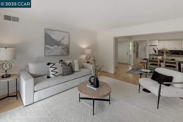 a bedroom with a bed and a night stand