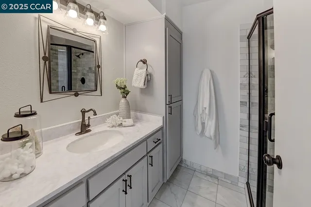 a bedroom with a bed and couch