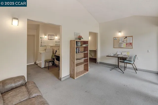 a view of a chairs and table in the patio