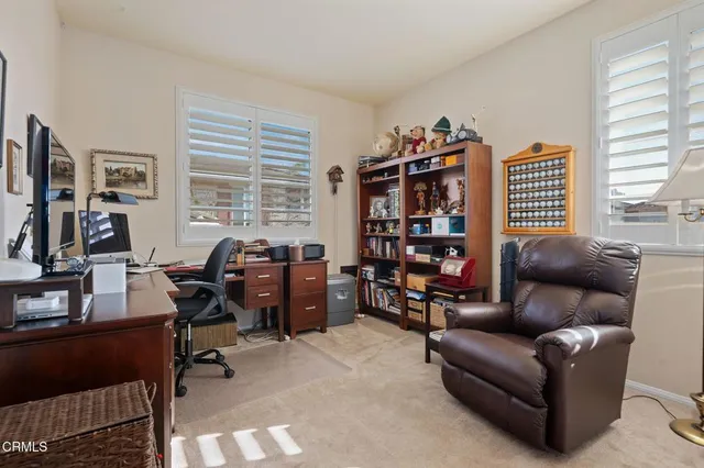 a view of storage and utility room with washer and dryer