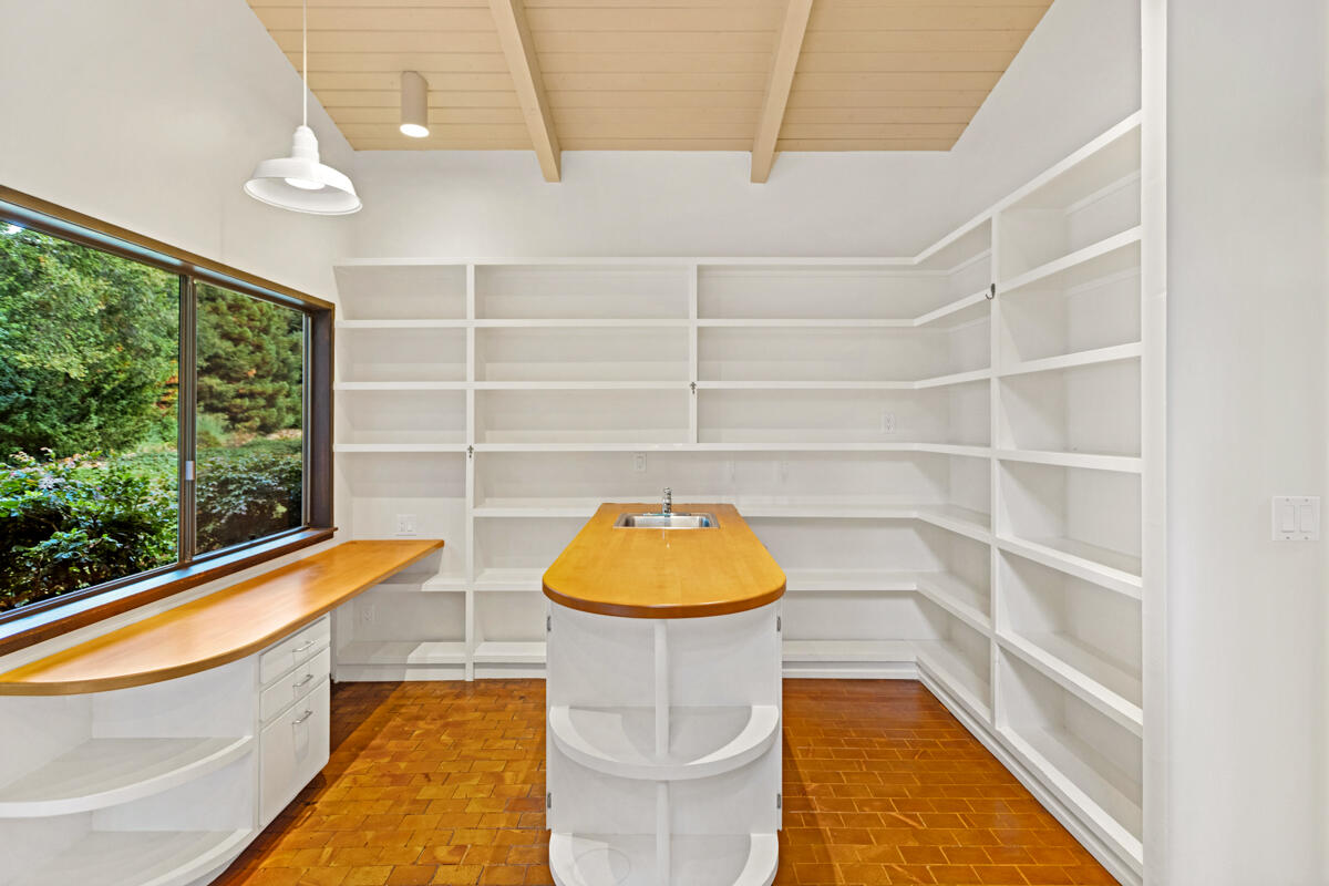 1681 East Valley Road Montecito, CA 93108 - Photo 23 of 61 a view of a bathtub in a room with a chandeliers
