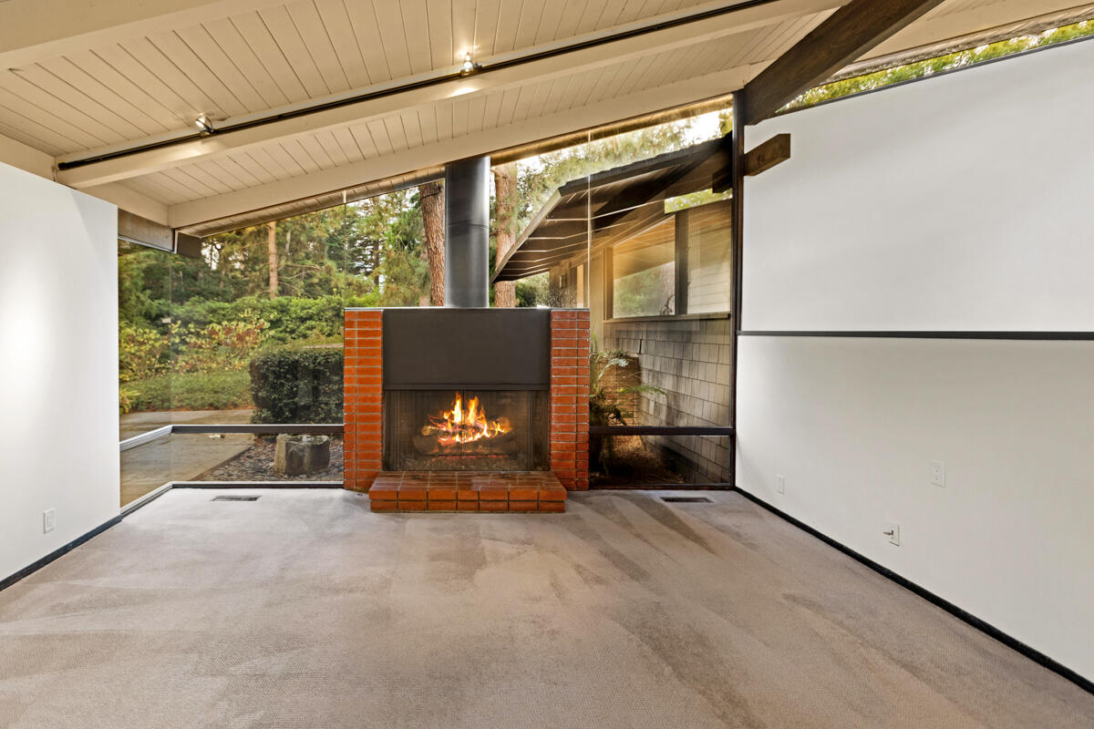1681 East Valley Road Montecito, CA 93108 - Photo 29 of 61 a view of empty room with a fireplace and window