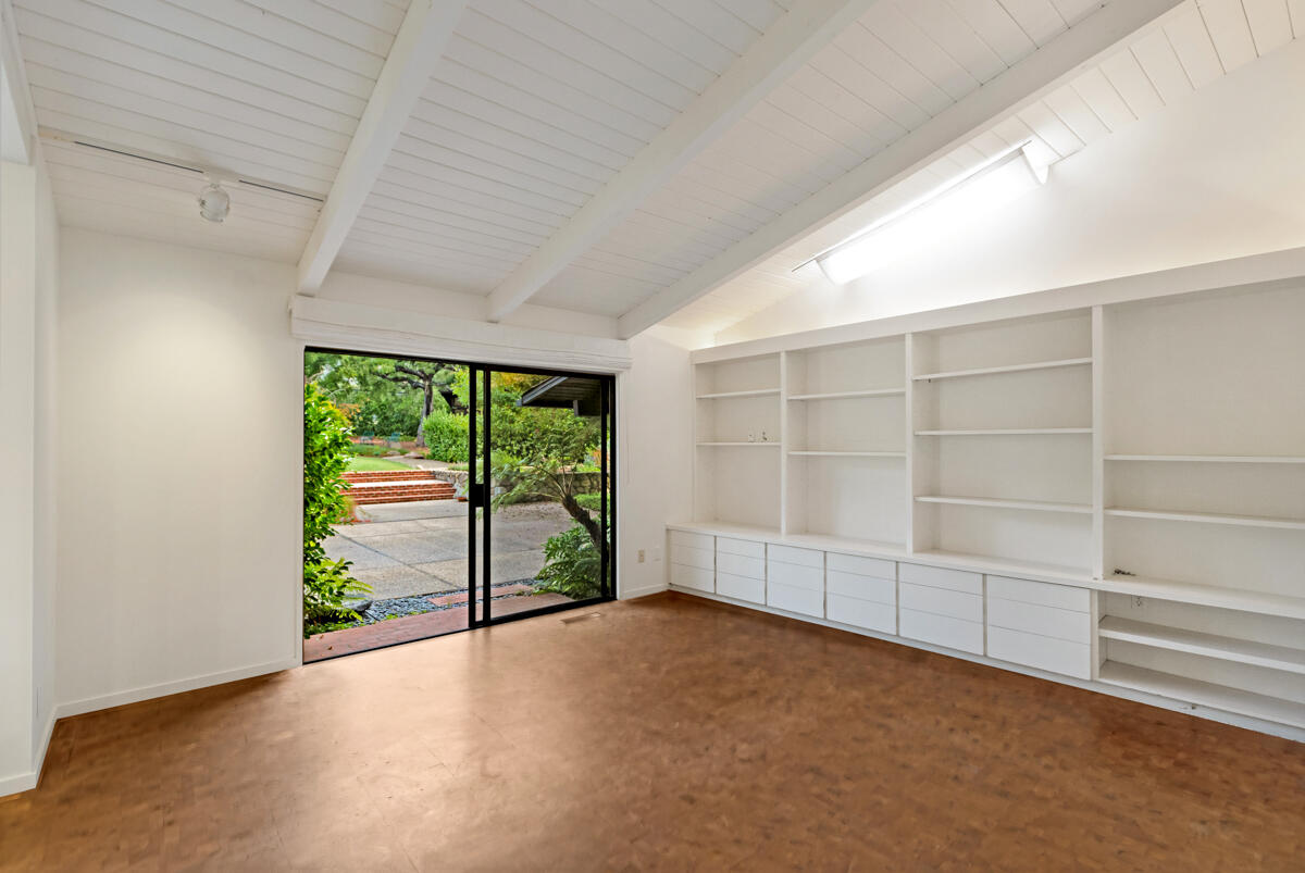 1681 East Valley Road Montecito, CA 93108 - Photo 34 of 61 an empty room with sliding glass door and mountain view