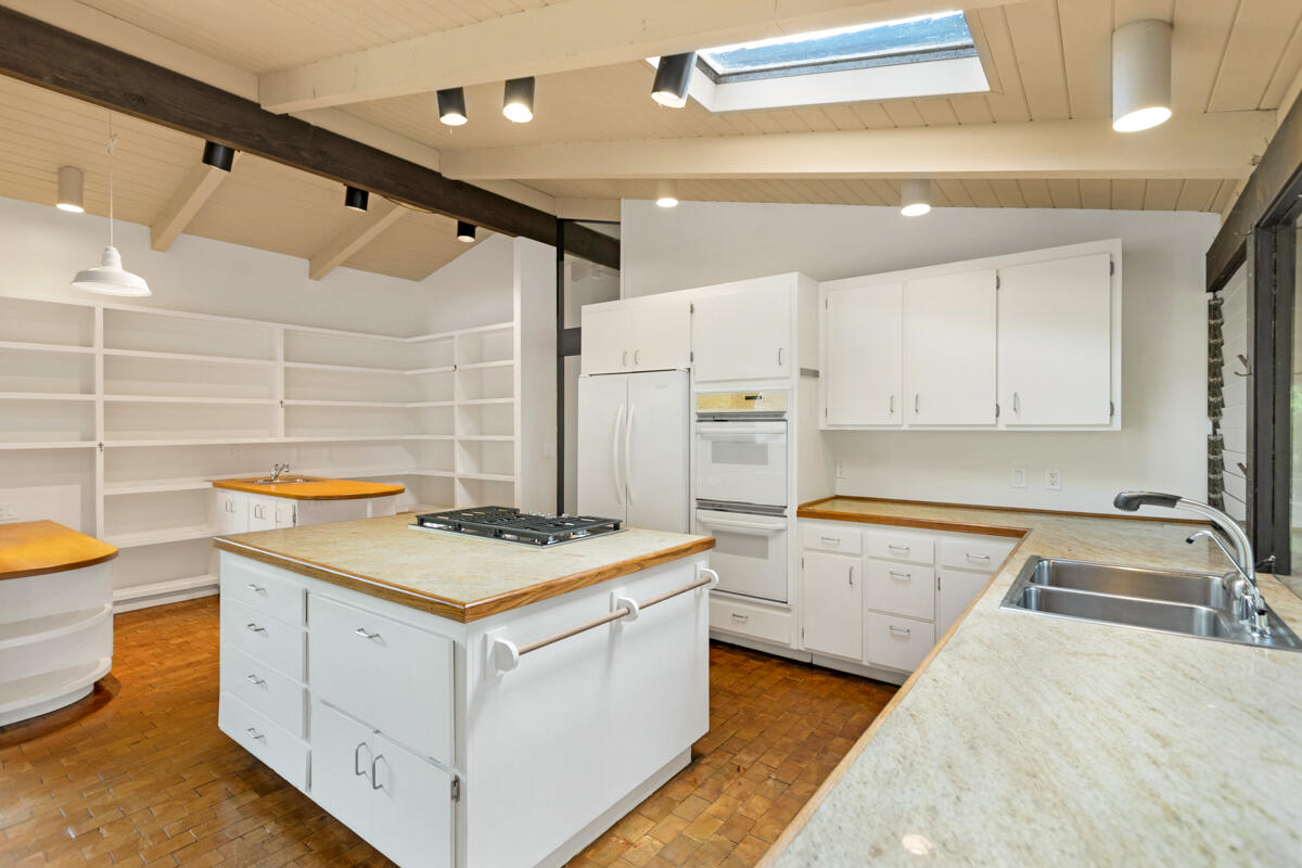 1681 East Valley Road Montecito, CA 93108 - Photo 37 of 61 a kitchen that has a sink and a stove