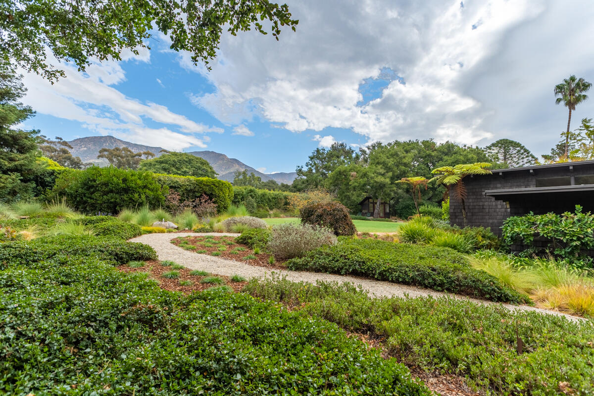 1681 East Valley Road Montecito, CA 93108 - Photo 52 of 61 a view of a garden with an buildings and street