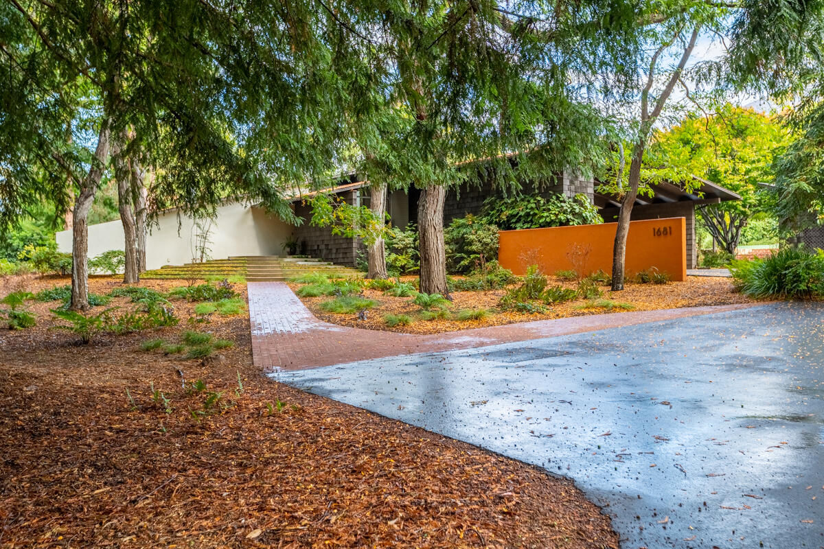 1681 East Valley Road Montecito, CA 93108 - Photo 7 of 61 a view of a yard with plants and trees