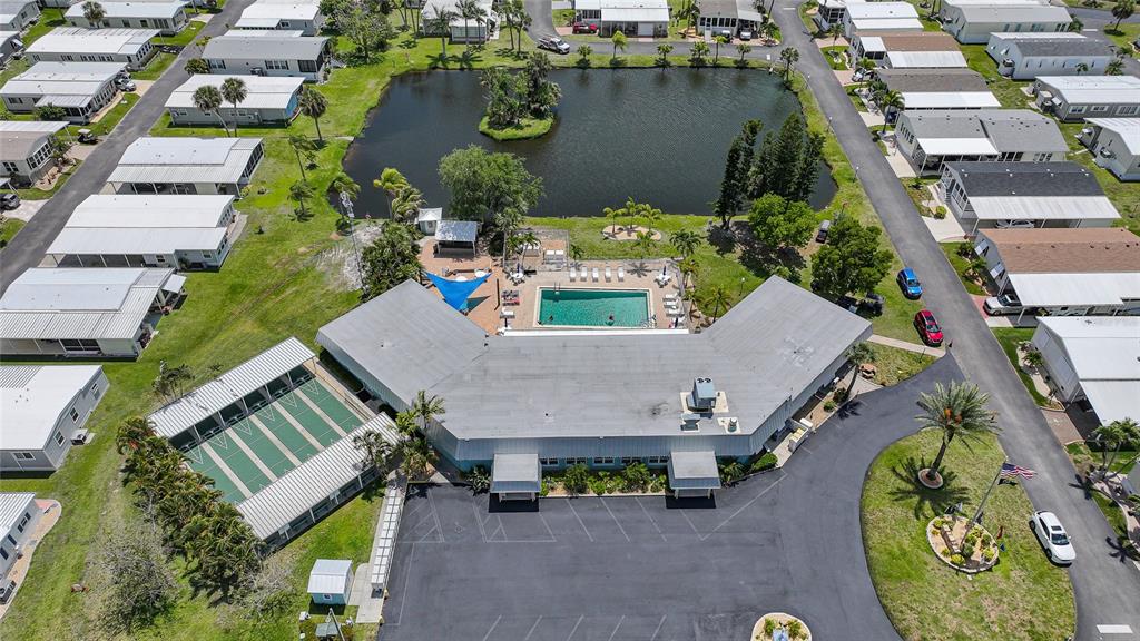10303 Burnt Store Road, Unit 143 Punta Gorda, FL 33950 - Photo 39 of 42 an aerial view of a house with a swimming pool
