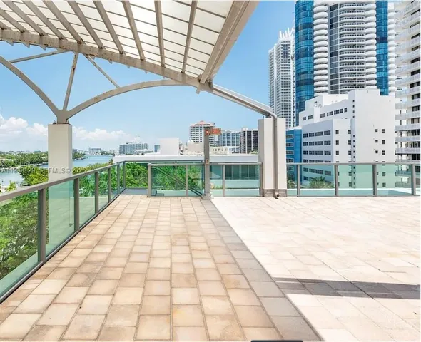 a view of a porch with a yard