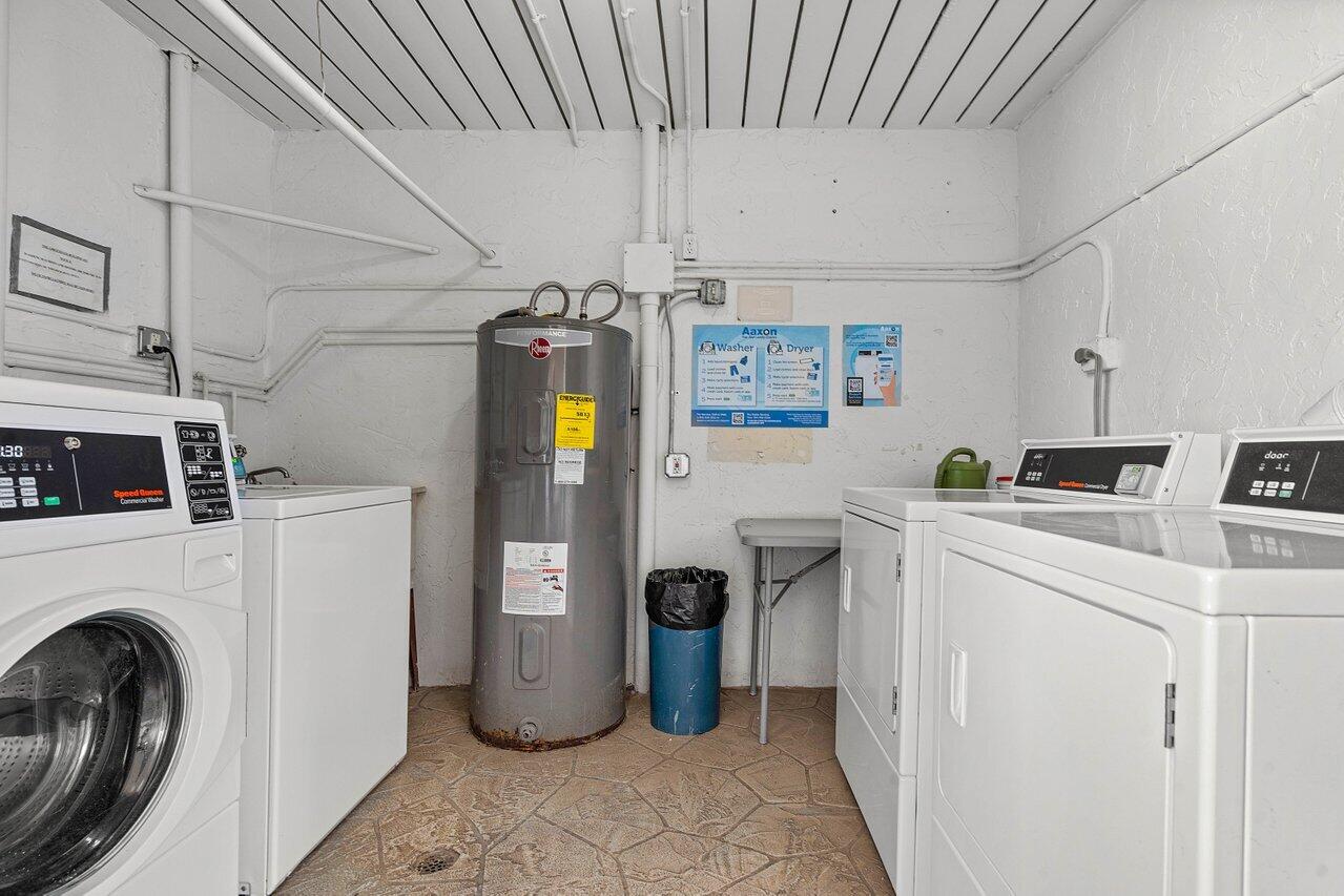 2601 Northeast 3rd Street, Unit 3040 Boynton Beach, FL 33435 - Photo 23 of 24 a utility room with dryer and washer