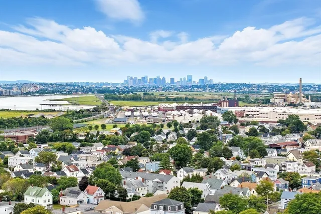 a view of a city with tall buildings