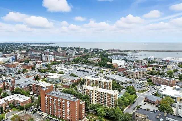a view of a city with an ocean view