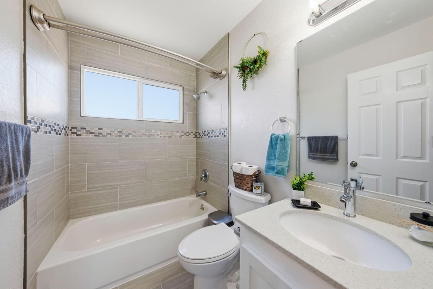 2793 Ruff Court Pinole, CA 94564 - Photo 30 of 53 a bathroom with a sink a toilet a tub and shower