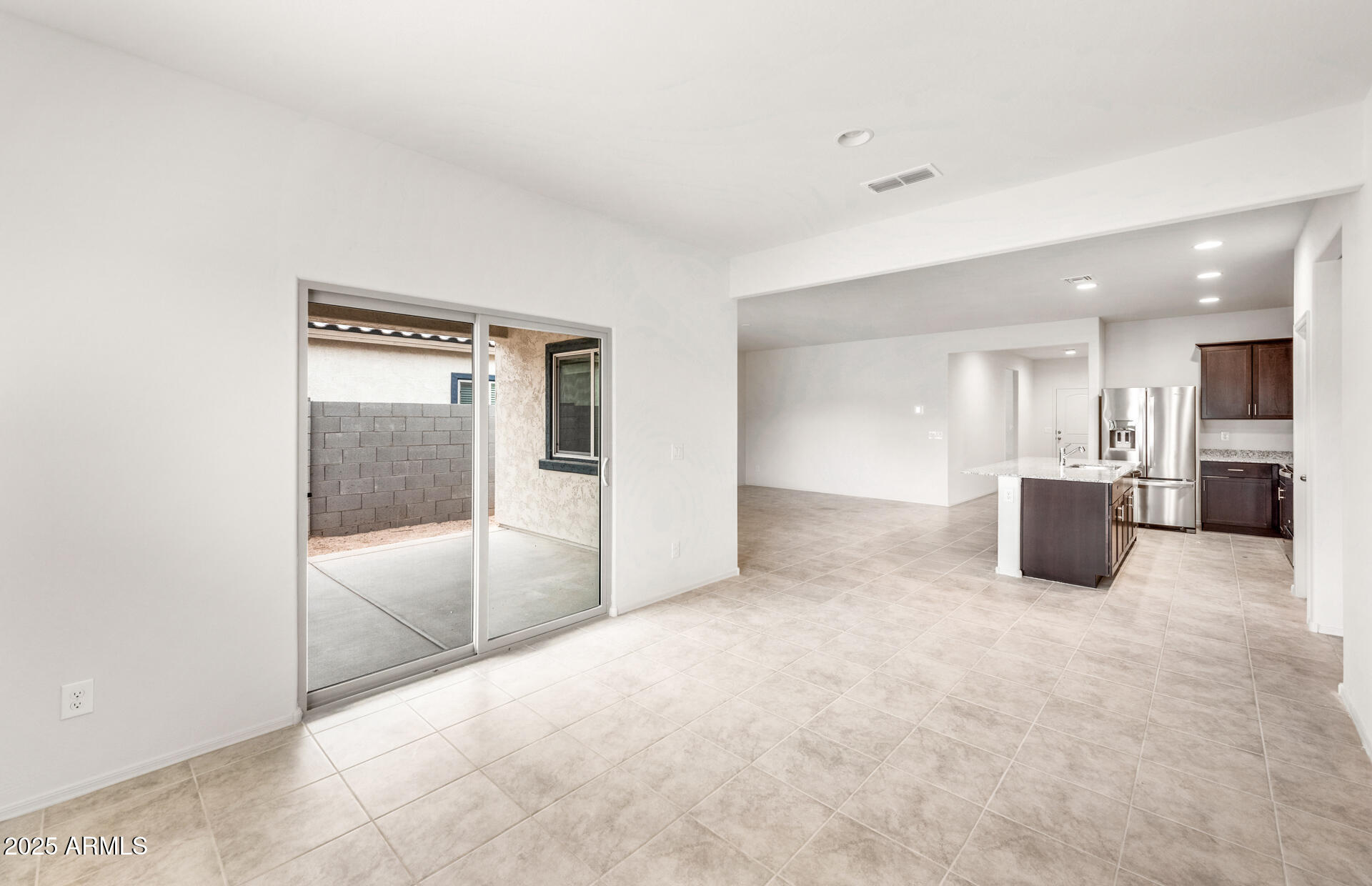 25480 West Chipman Road Buckeye, AZ 85326 - Photo 11 of 24 9 - Gathering Room and Kitchen