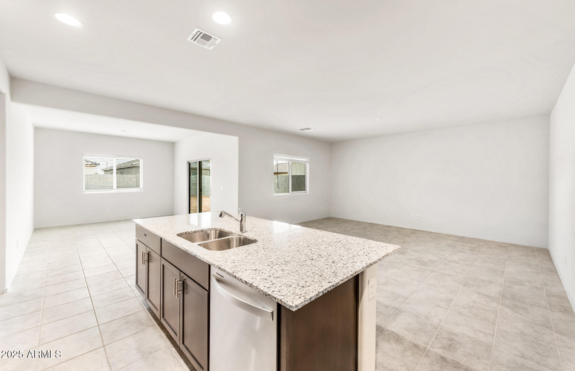 25480 West Chipman Road Buckeye, AZ 85326 - Photo 7 of 24 5 - Kitchen and Gathering Room
