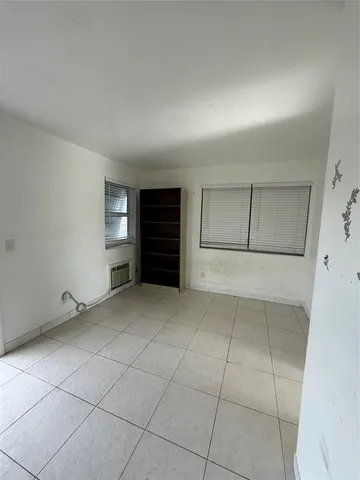 a room with a black and white checkered floor
