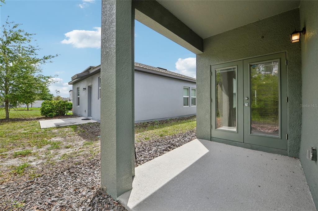 2352 Litchfield Loop DeLand, FL 32720 - Photo 19 of 24 a view of backyard of the house