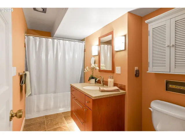 a view of balcony with wooden floor