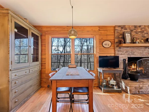 a kitchen with stainless steel appliances granite countertop a refrigerator a stove and a sink with dishwasher