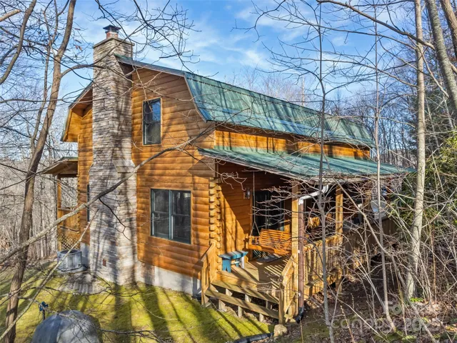 a blue sign that is on the side of a street