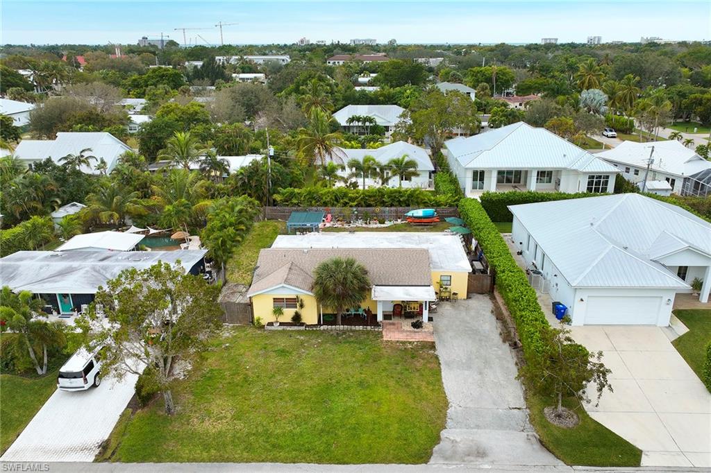 1343 12th Street North Naples, FL 34102 - Photo 15 of 18 a picture of houses with outdoor space