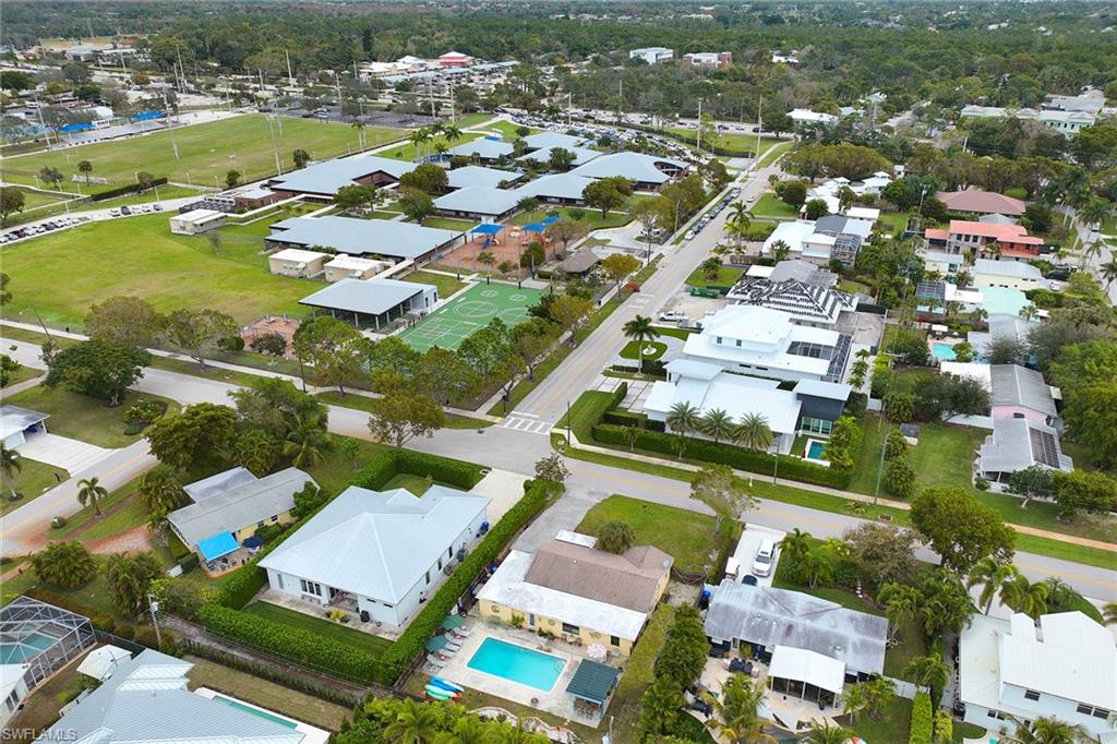 1343 12th Street North Naples, FL 34102 - Photo 17 of 18 an aerial view of residential houses with outdoor space