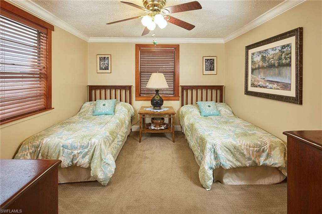 1343 12th Street North Naples, FL 34102 - Photo 10 of 18 a bedroom with bed and window