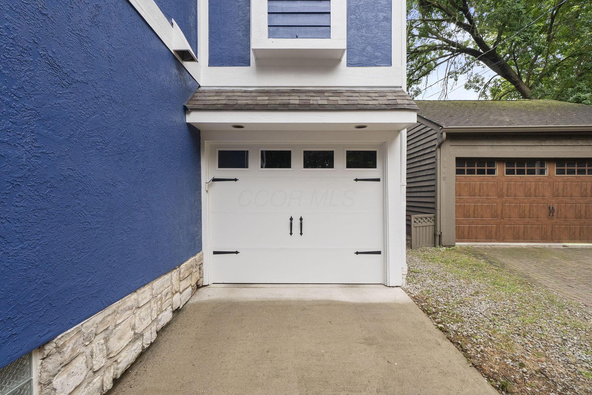 1851 Berkshire Road Columbus, OH 43221 - Photo 91 of 125 Attached garage with brick driveway.