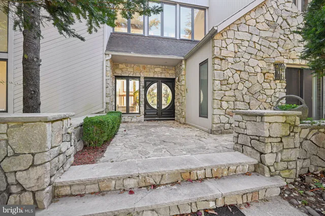 a view of an entryway with staircase