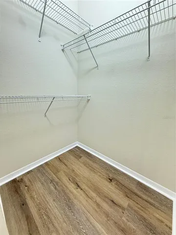 a view of a room with racks on the wall