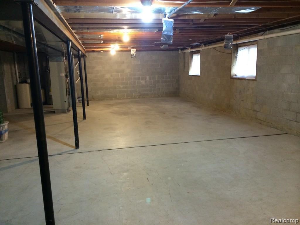 9281 North Gregory Road Fowlerville, MI 48836 - Photo 15 of 17 Great space for storage, finishing or play.