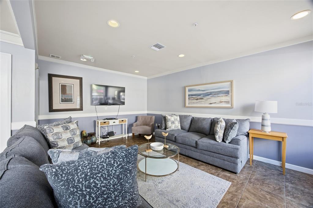 4221 West Spruce Street, Unit 2328 Tampa, FL 33607 - Photo 26 of 40 a living room with furniture and a couch