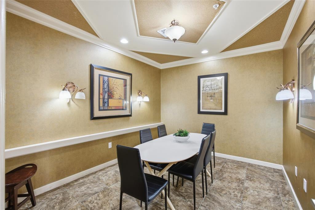 4221 West Spruce Street, Unit 2328 Tampa, FL 33607 - Photo 27 of 40 a view of a dining room with furniture