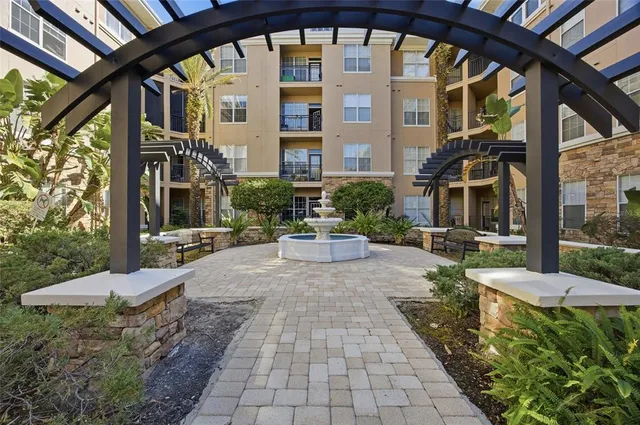 a view of a building with sitting area