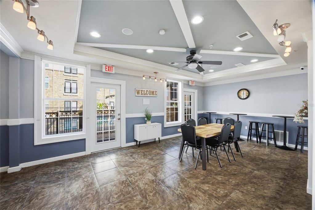 4221 West Spruce Street, Unit 2328 Tampa, FL 33607 - Photo 31 of 40 a dining room with furniture and window