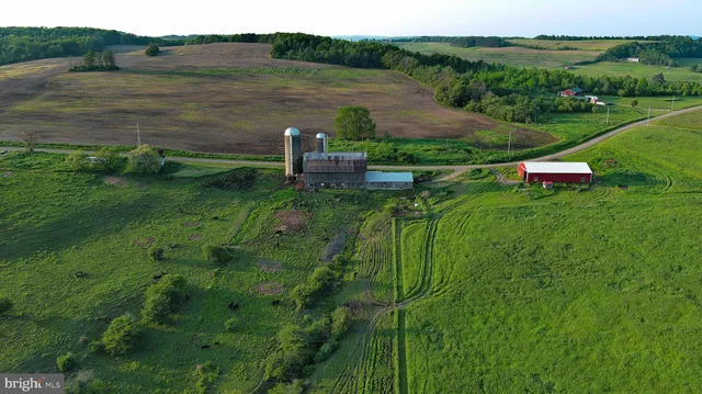 a view of a lake with a yard