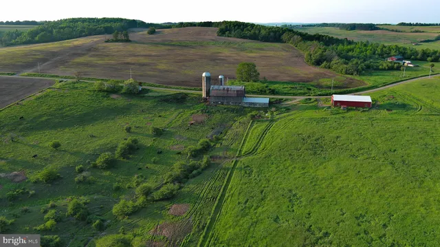 a view of lake with green field