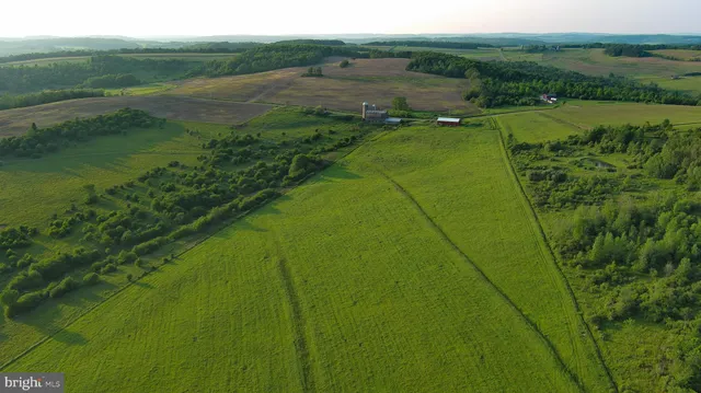 a view of a lake with a big yard