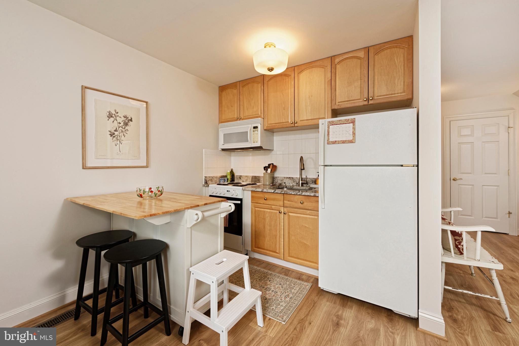 20084 Woodtrail Road Round Hill, VA 20141 - Photo 5 of 31 Kitchen has granite counters, good storage+ island