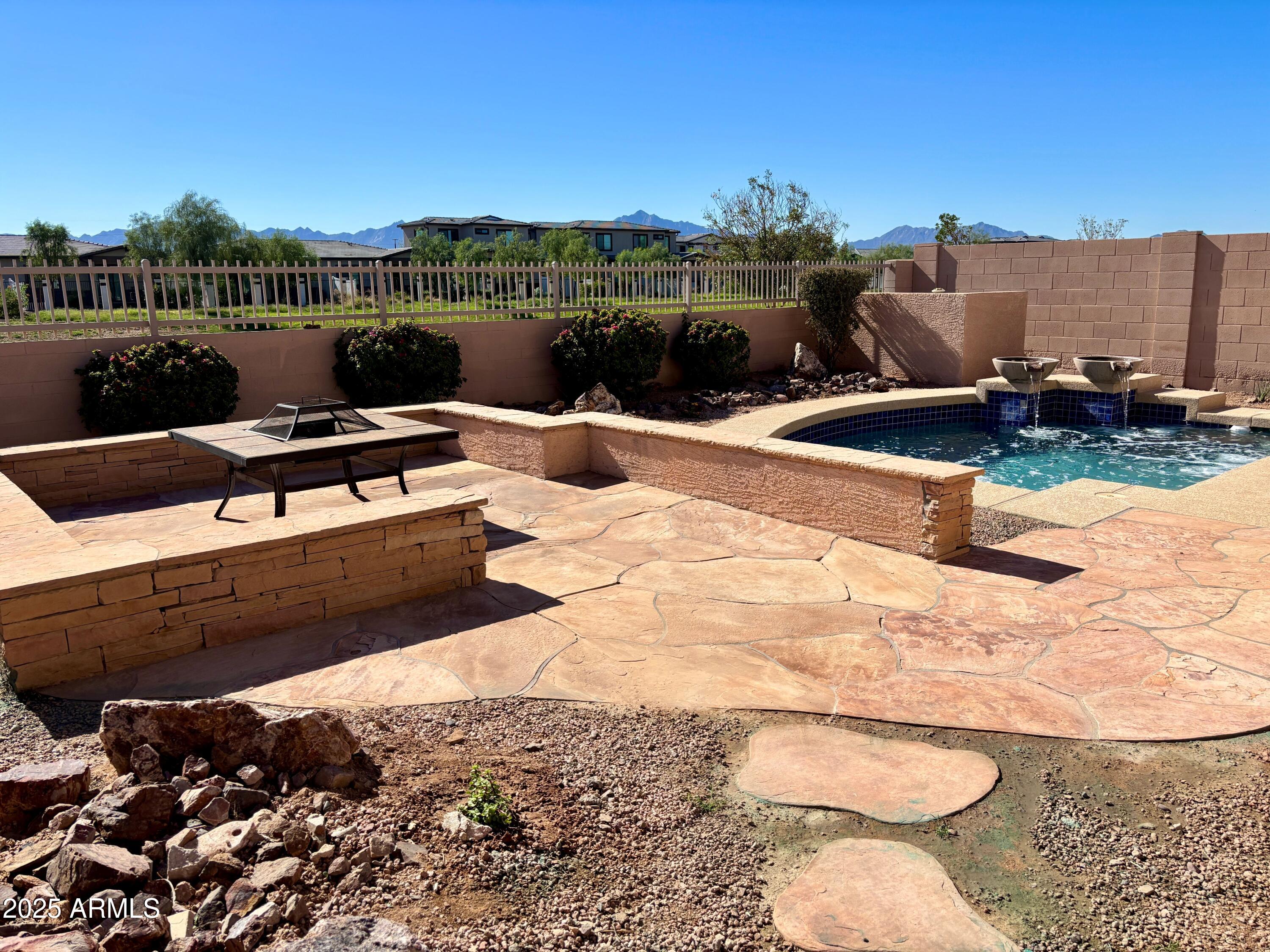 5139 West Maldonado Road Laveen, AZ 85339 - Photo 37 of 39 a view of a terrace with chairs and wooden floor