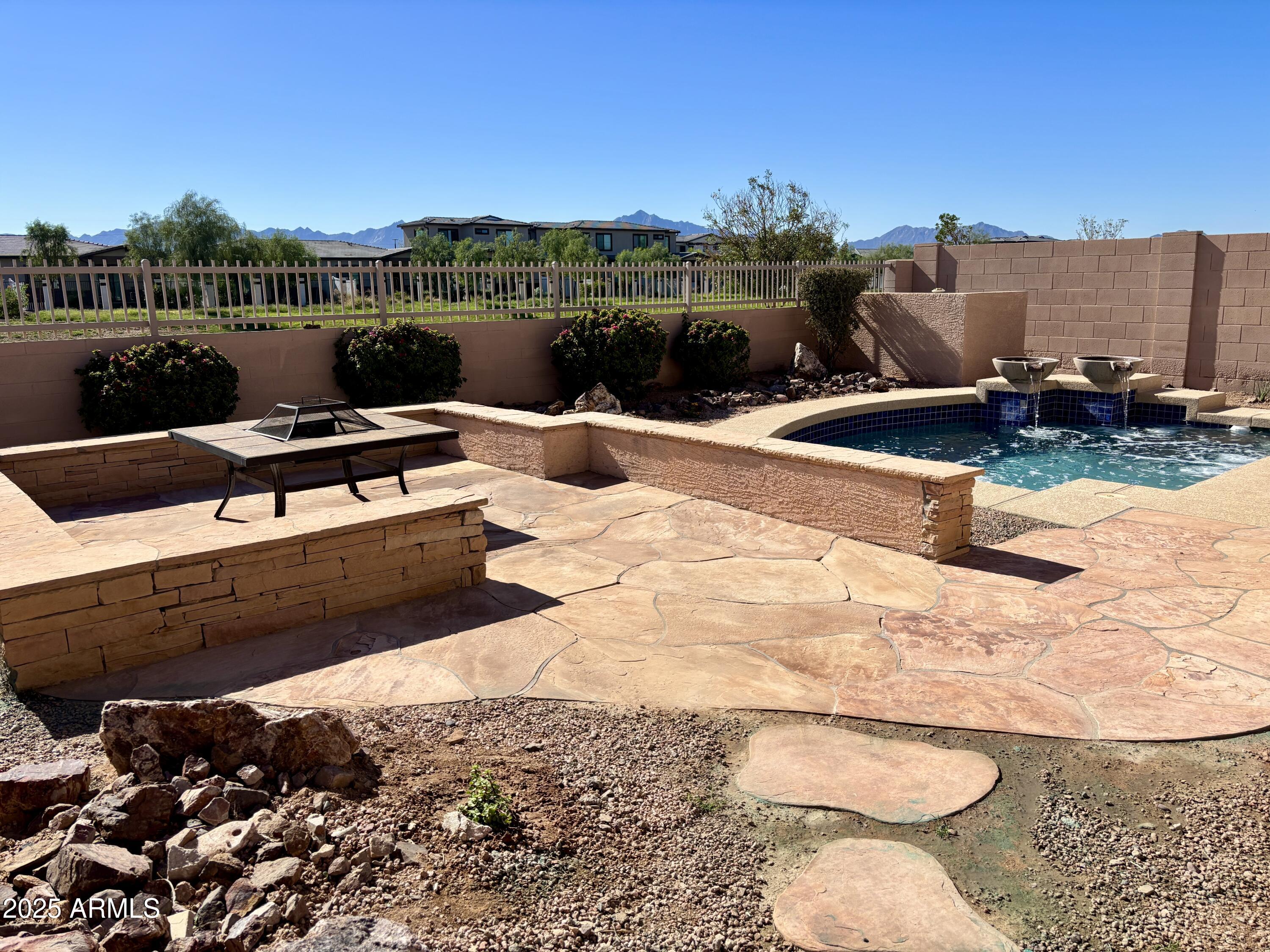 5139 West Maldonado Road Laveen, AZ 85339 - Photo 38 of 39 a view of a terrace with chairs and wooden floor