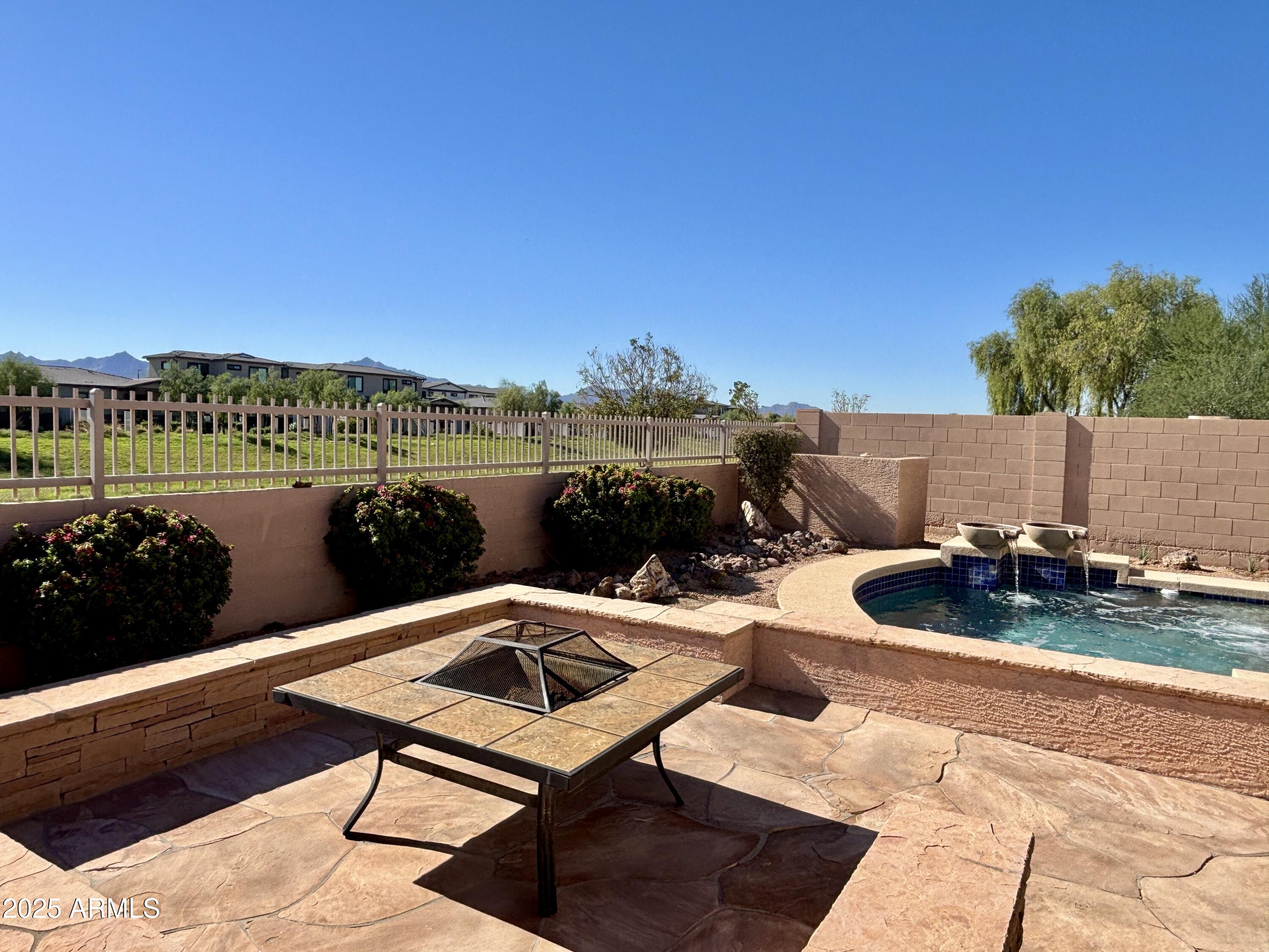 5139 West Maldonado Road Laveen, AZ 85339 - Photo 39 of 39 a terrace with outdoor seating and city view