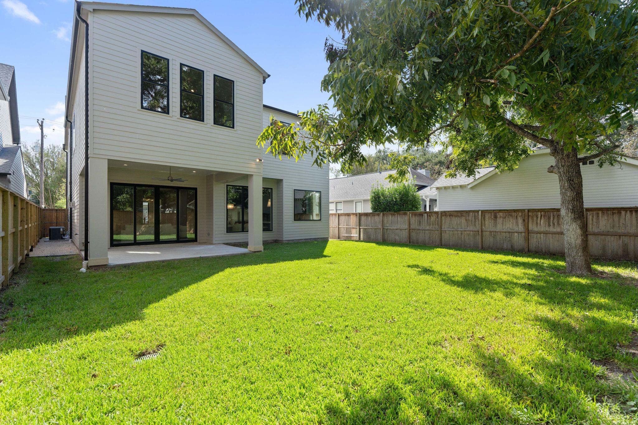 711 East 12th Street Houston, TX 77008 - Photo 14 of 47 A backyard worth lingering in. This expansive lawn offers room for a pool, play, gardening, and gathering. Beautifully positioned in the corner, the mature tree casts priceless shade while leaving the heart of the yard wide open.