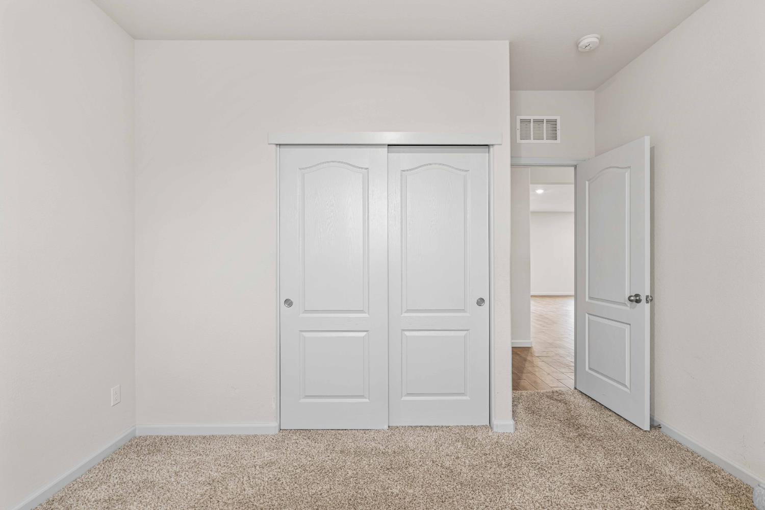 3095 Tower Street Manteca, CA 95337 - Photo 13 of 40 an empty room with closet area