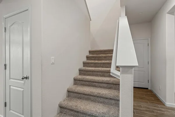 a view of entryway with wooden floor