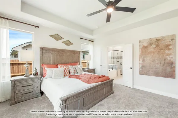 a bedroom with a bed a dresser and a large window