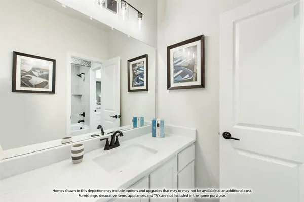 a bathroom with a sink a window and a mirror