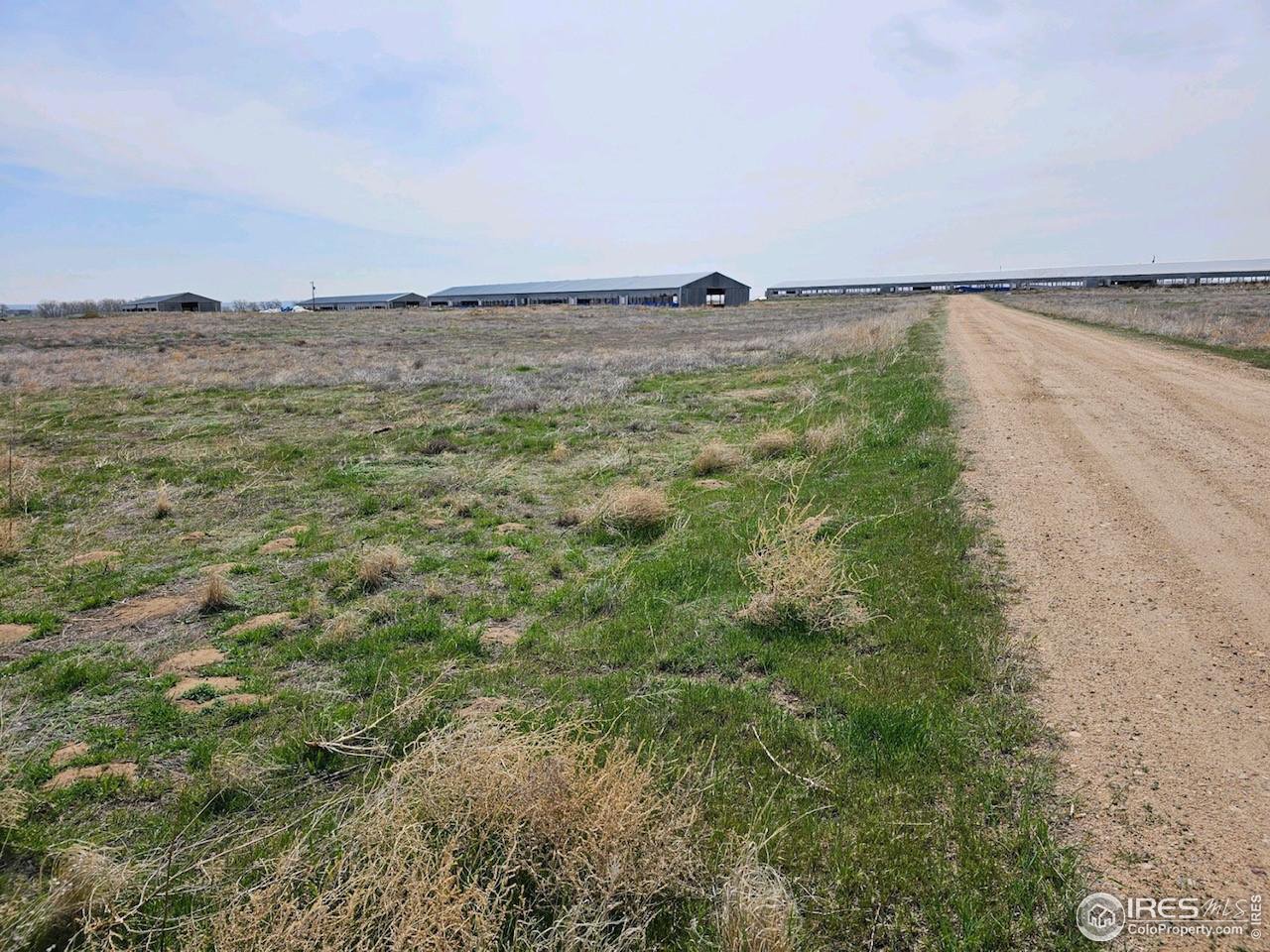 0 County Road 19 Fort Lupton, CO 80621 - Photo 4 of 9 a view of an ocean beach and mountain
