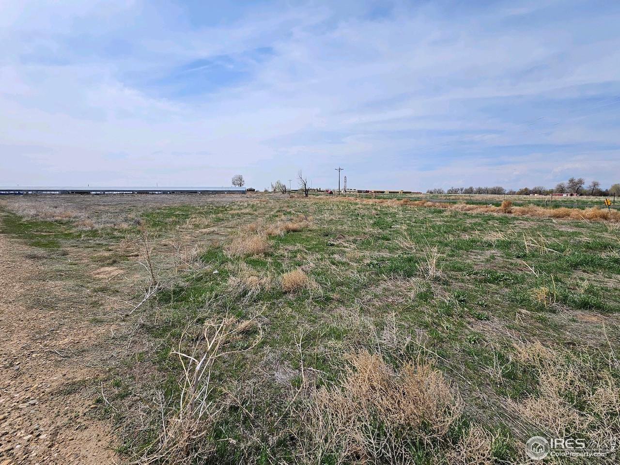 0 County Road 19 Fort Lupton, CO 80621 - Photo 5 of 9 a view of a field with an ocean