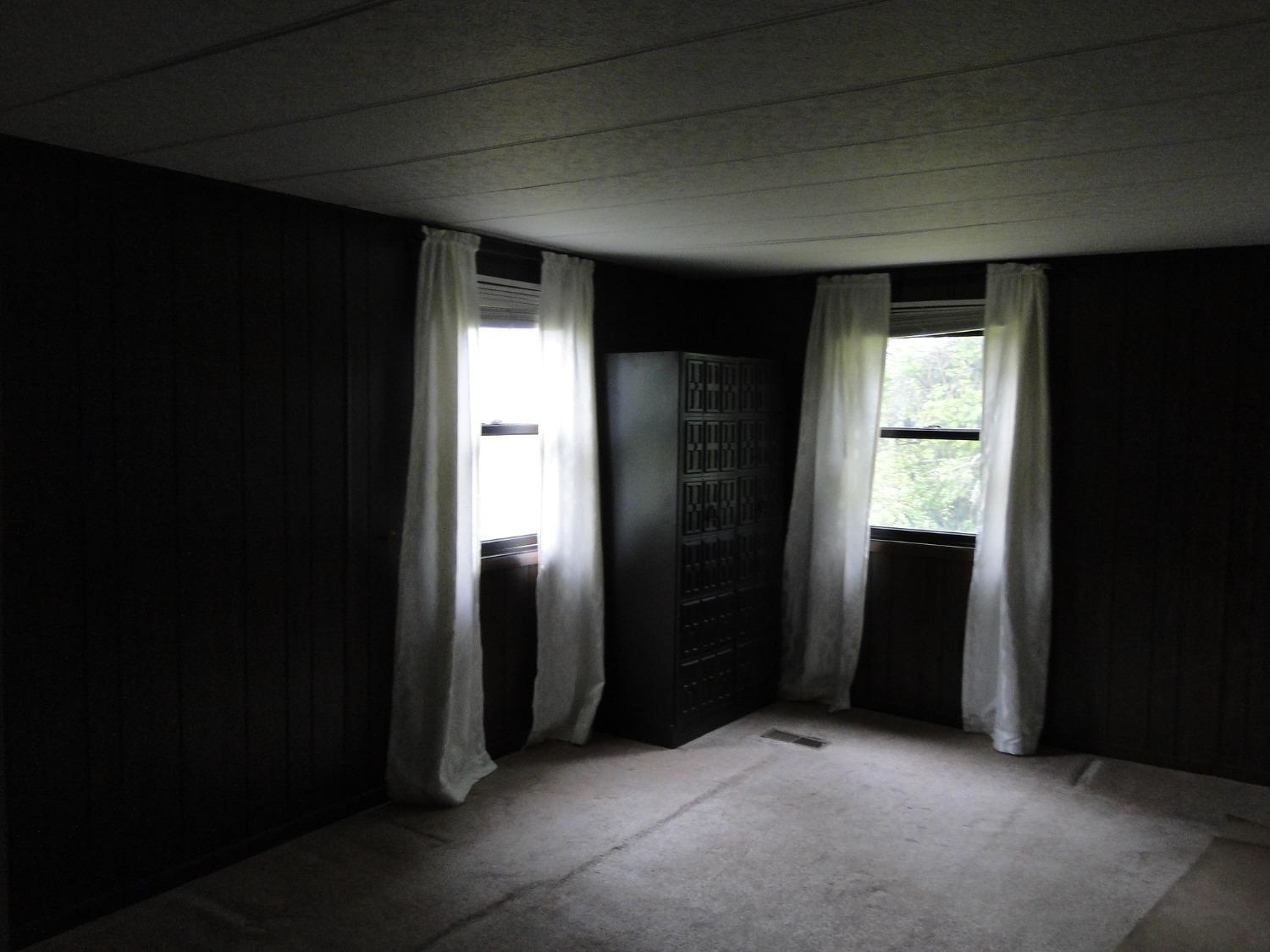 612 West 100 South Hebron, IN 46341 - Photo 11 of 18 an empty room with closet and windows